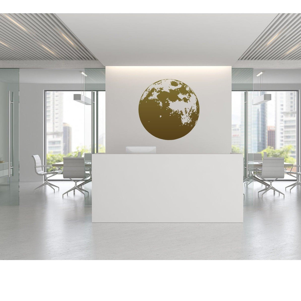 Modern office reception area featuring a large moon wall decor decal on a clean white wall.