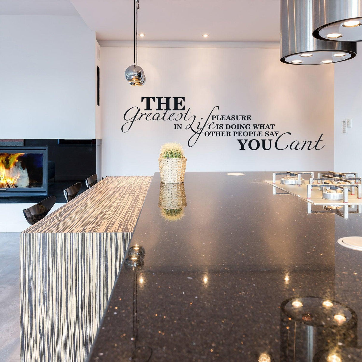 Elegant wall quote decal in modern kitchen inspiring creativity and motivation with a stylish design.