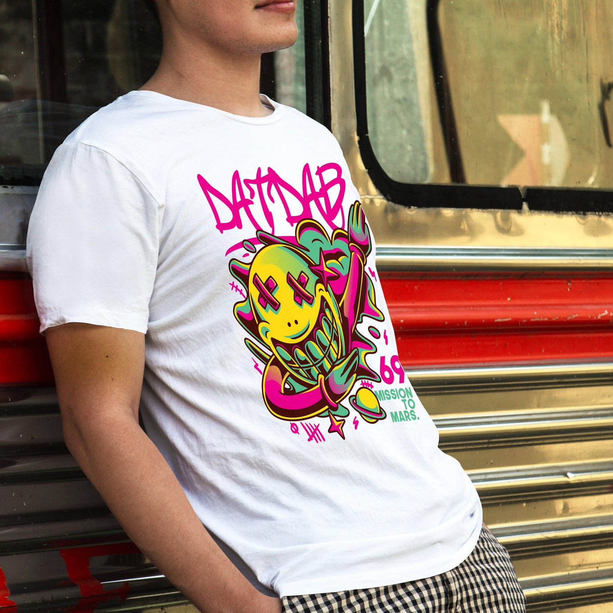 Model wearing a DYE t-shirt featuring colorful graphic design and text, showcasing unique custom style.