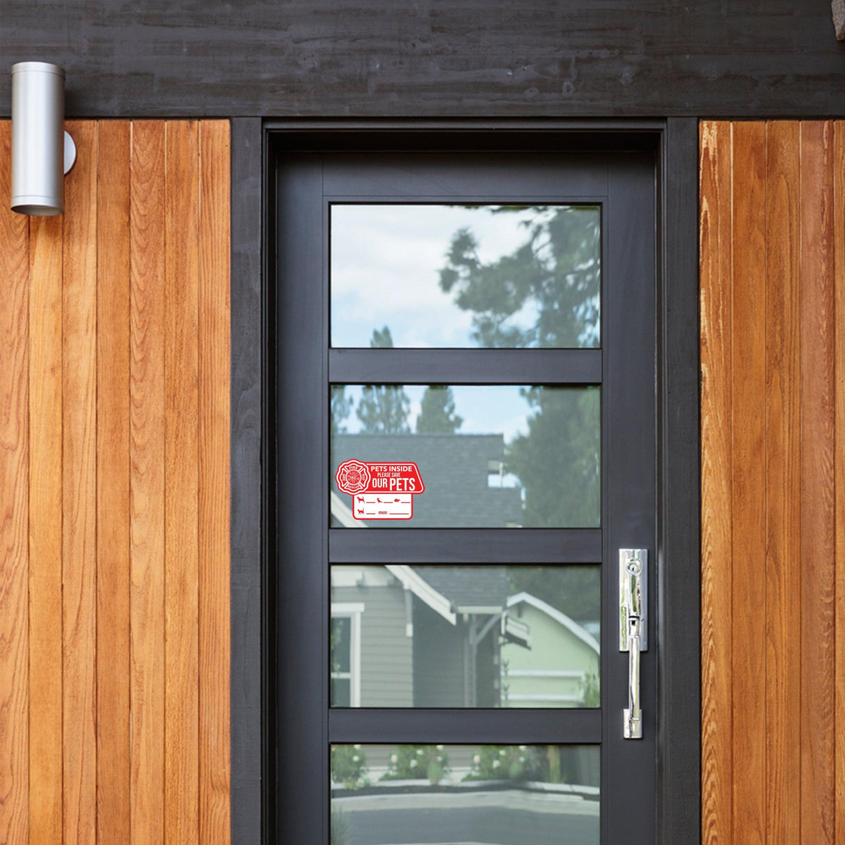 Front door featuring a Pet Alert Emergency Cling Sticker for notifying responders of pets inside.