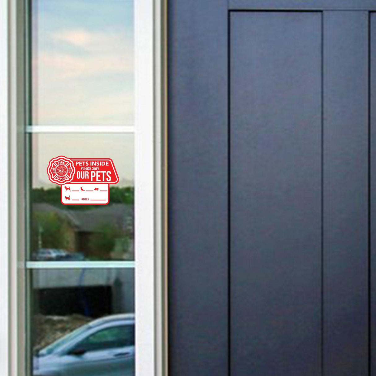 Emergency cling sticker on a window indicating pets are inside the home.
