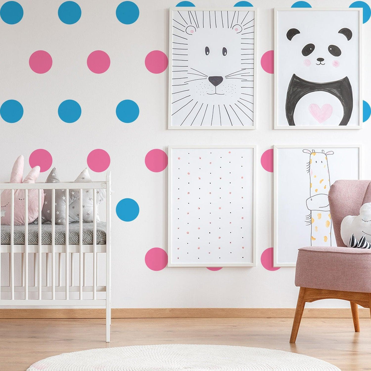 Colorful kids room with blue and pink vinyl wall decals, framed animal art, and a cozy crib for nursery decor.