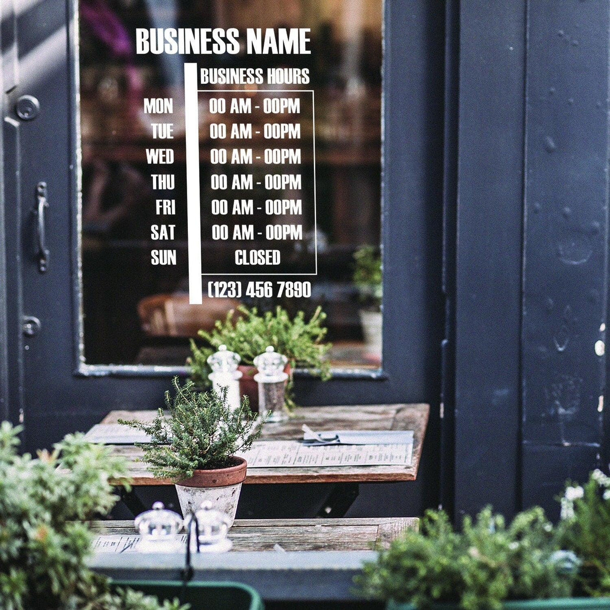 Custom business hours vinyl sign on restaurant window with schedule and contact number.