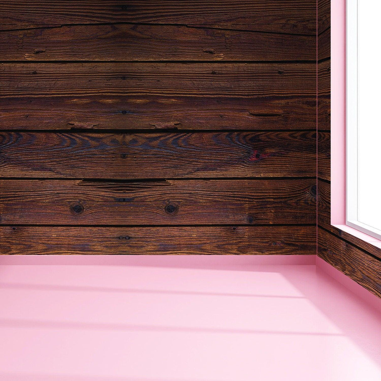 Wood wall wallpaper sticker in a corner with pink accent, showcasing rustic charm and warm hues.