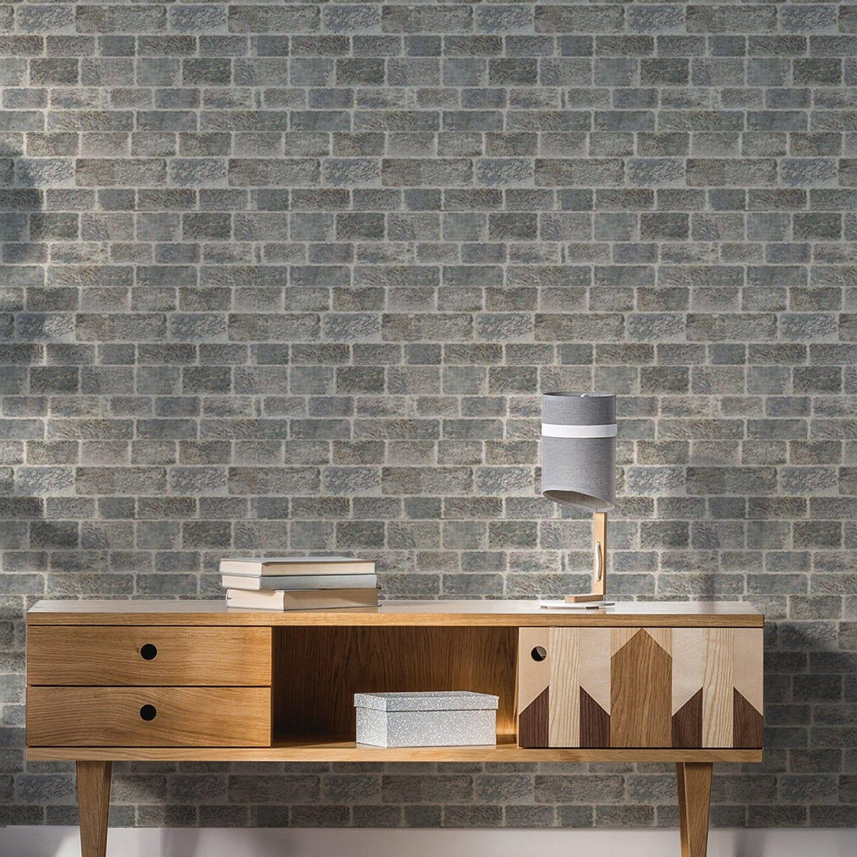 Brick self-adhesive wallpaper with a 3D effect in a modern living room setting.