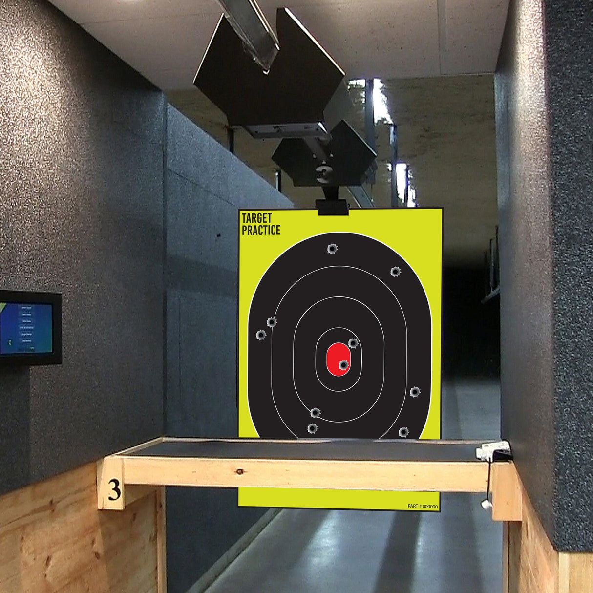Large outdoor shooting target for gun practice at shooting range, featuring black circles on a yellow background.