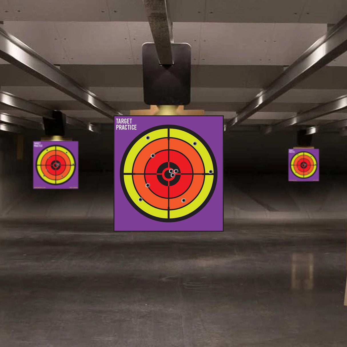 Indoor shooting range featuring large circle practice targets for rifles and handguns.
