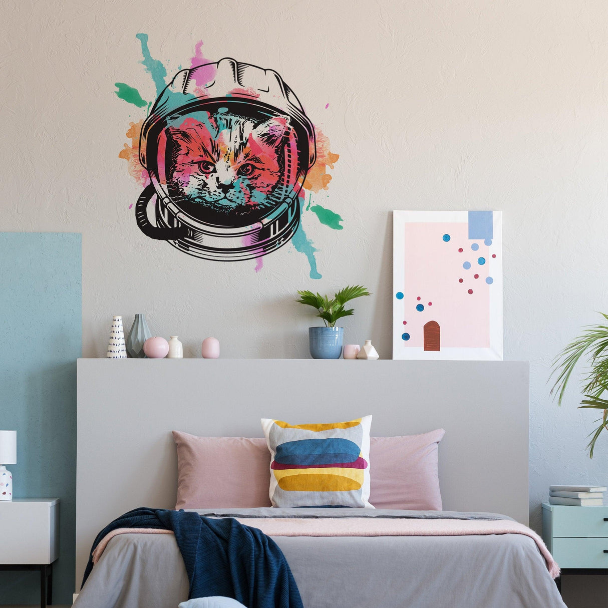 Space cat wall art transfer sticker of an astronaut kitten with colorful splashes for quirky home decor.