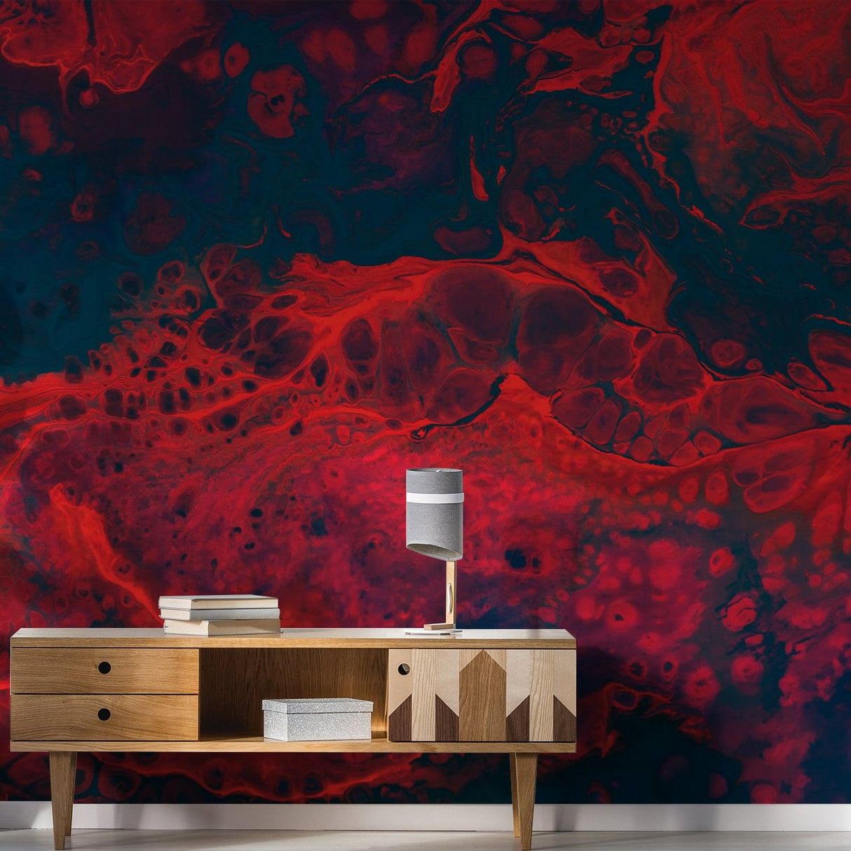 Vibrant red and blue marble vinyl wallpaper backdrop with stylish furniture for modern interior design inspiration.
