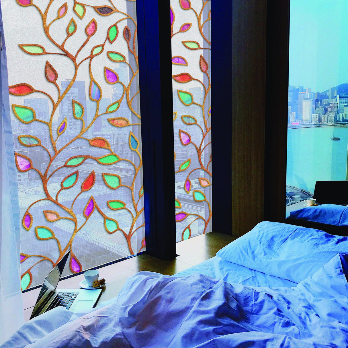 Leaf window privacy glass film with colorful leaf design in modern bedroom setting, adding elegance and privacy.