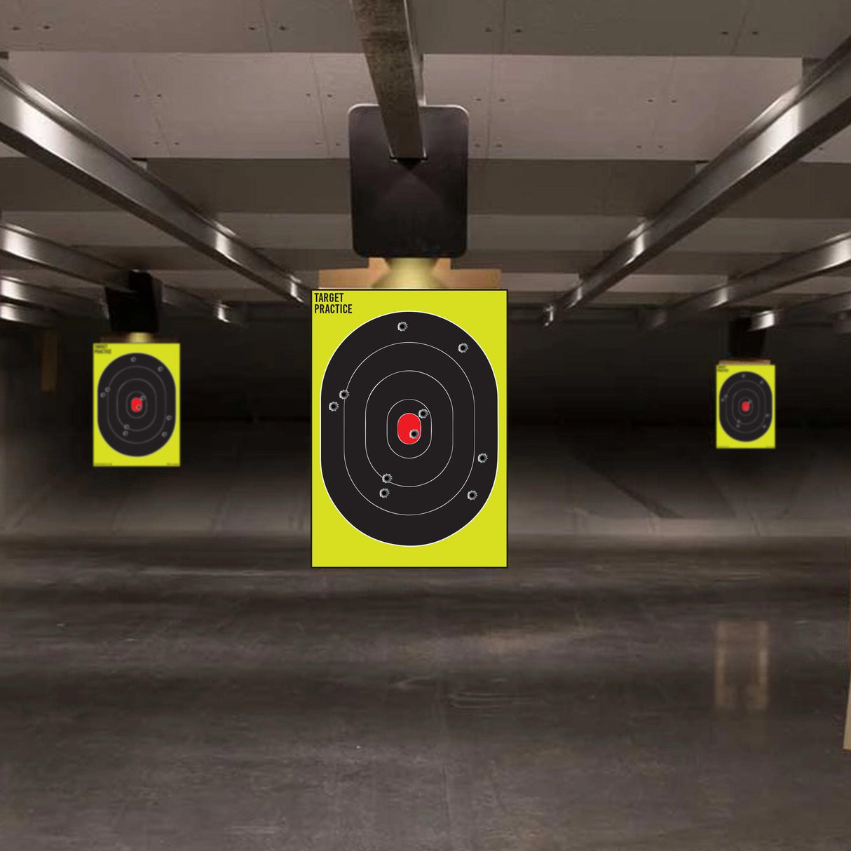 Indoor shooting range with large paper targets for gun practice, highlighting precision target shooting skills.