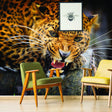 Jaguar wallpaper mural featuring a fierce jaguar face, complementing modern chairs in a stylish living room.