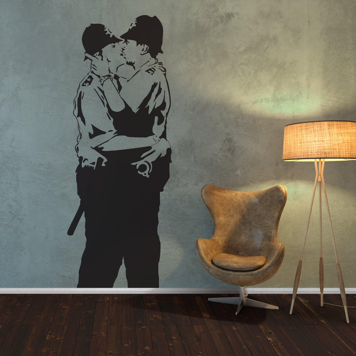 Banksy Police Kissing Wall Sticker on a textured wall with a chair and lamp, showcasing iconic street art style.