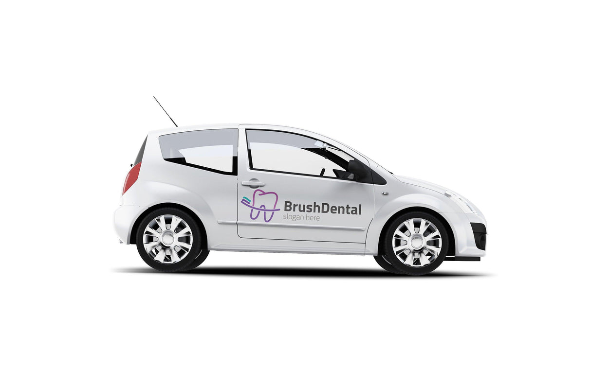 White car with BrushDental logo on the side, promoting dental services and brand visibility.