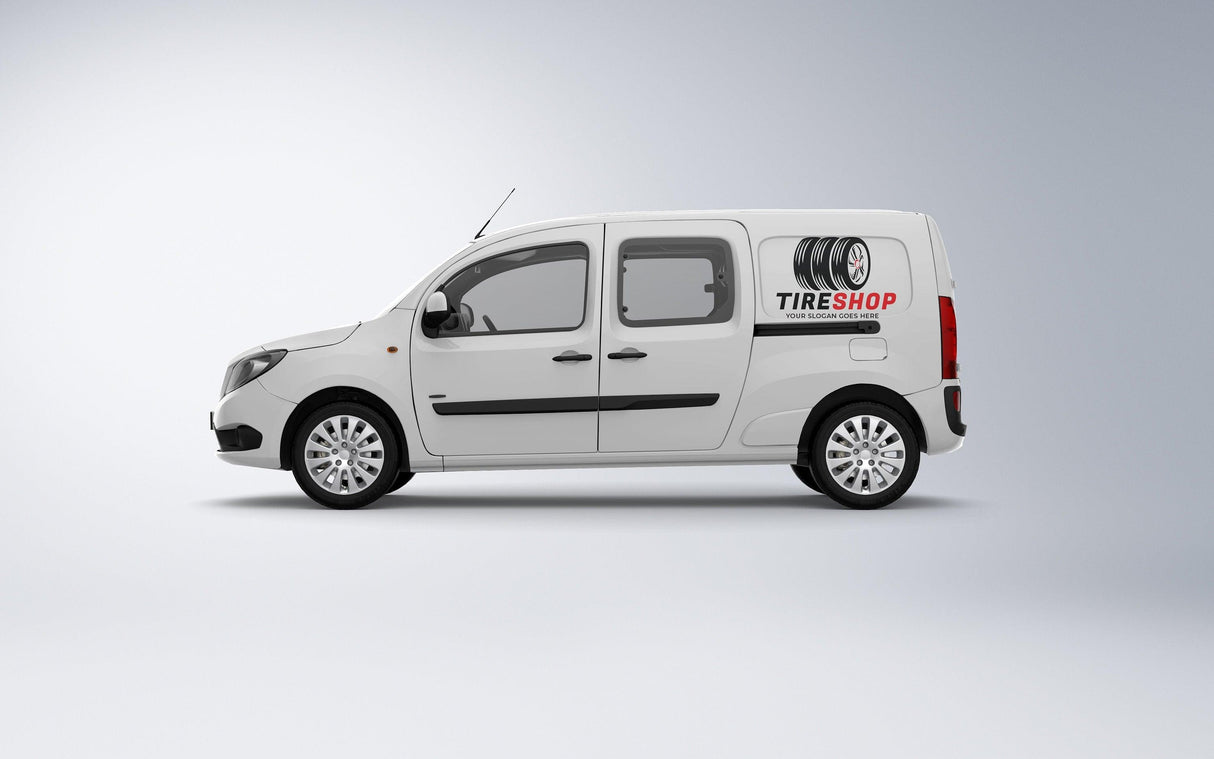 White van with "TIRESHOP" branding, showcasing vehicle graphics for a tire shop service.