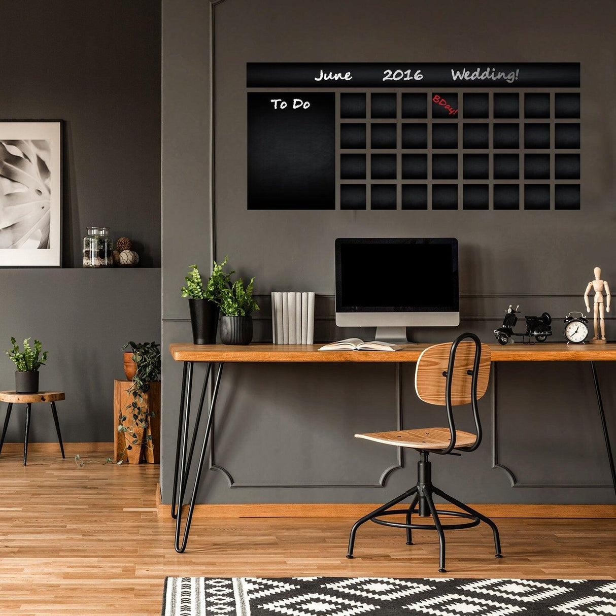 Chalkboard wall planner in a modern home office, featuring to-do list for June 2016 and wedding preparations.
