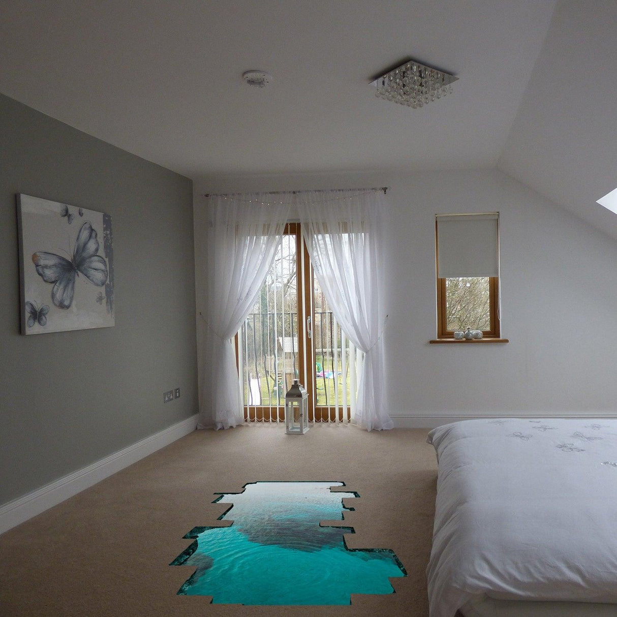 3D ocean floor sticker in a stylish bedroom, adding a whimsical underwater decor element to the room.