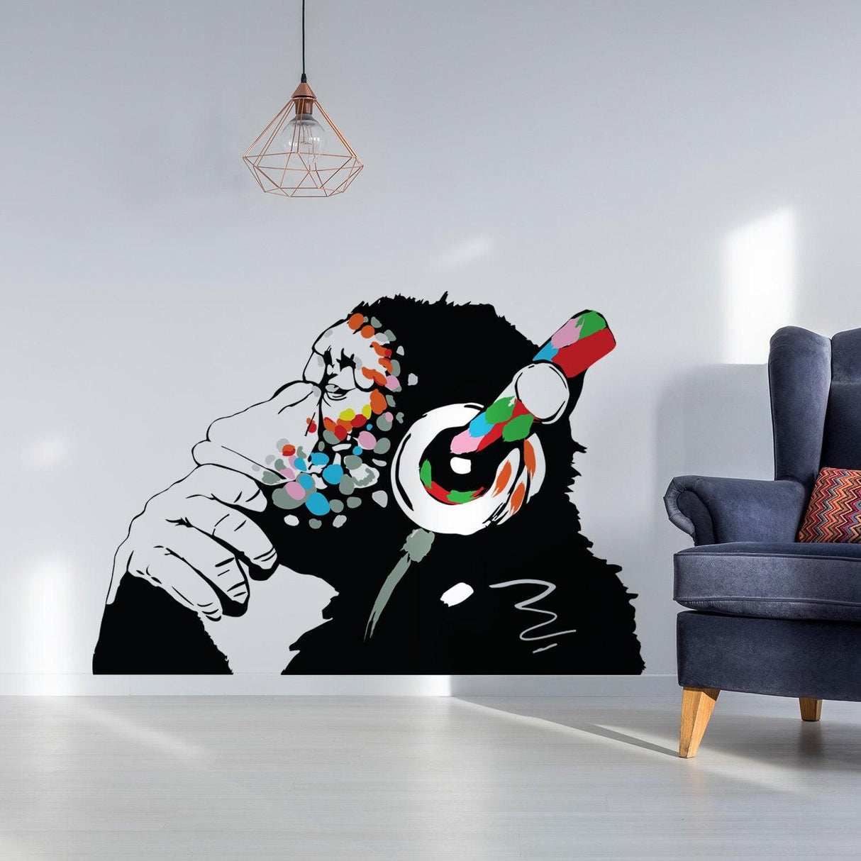 Colorful monkey wall art decal with headphones, adding urban style to any modern room decor.