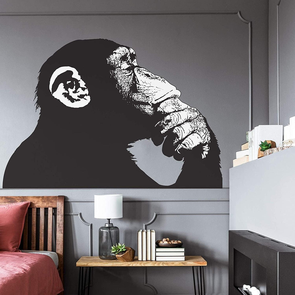 Banksy Monkey With Headphones wall sticker in a stylish living room, adding creativity and humor to the decor.