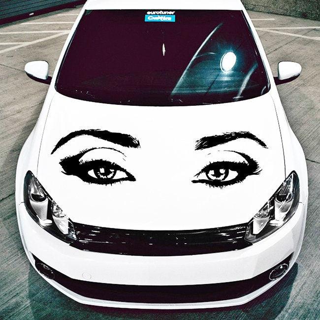 Car hood decal featuring striking female eyes design for a unique automotive aesthetic.
