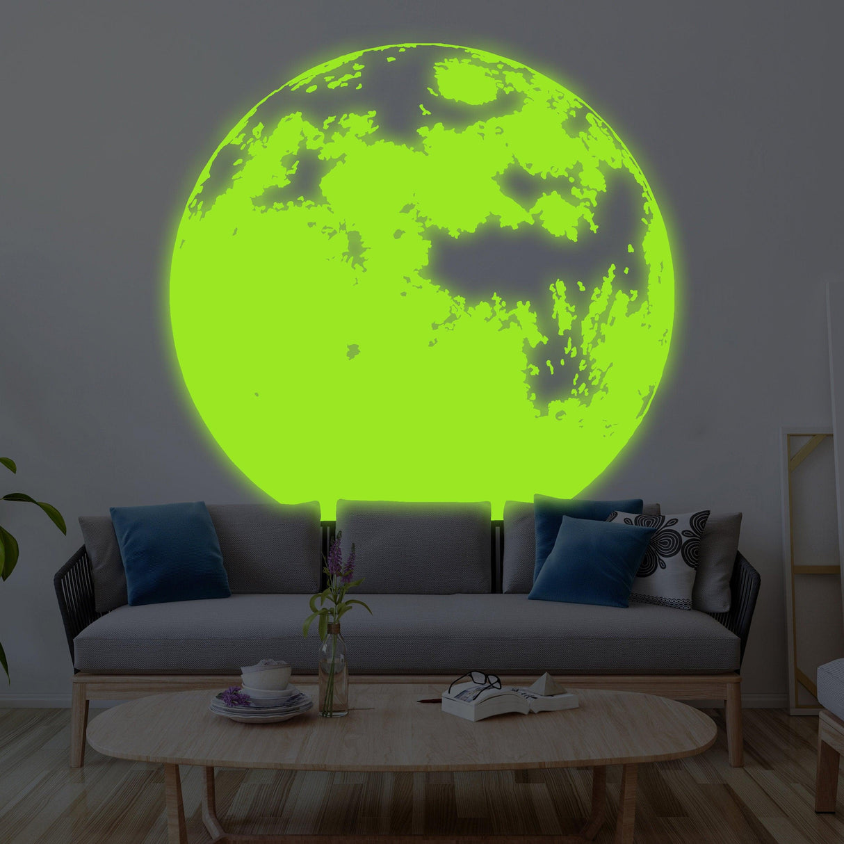 Glow in the dark moon wall sticker in a living room, enhancing the decor with magical illumination.
