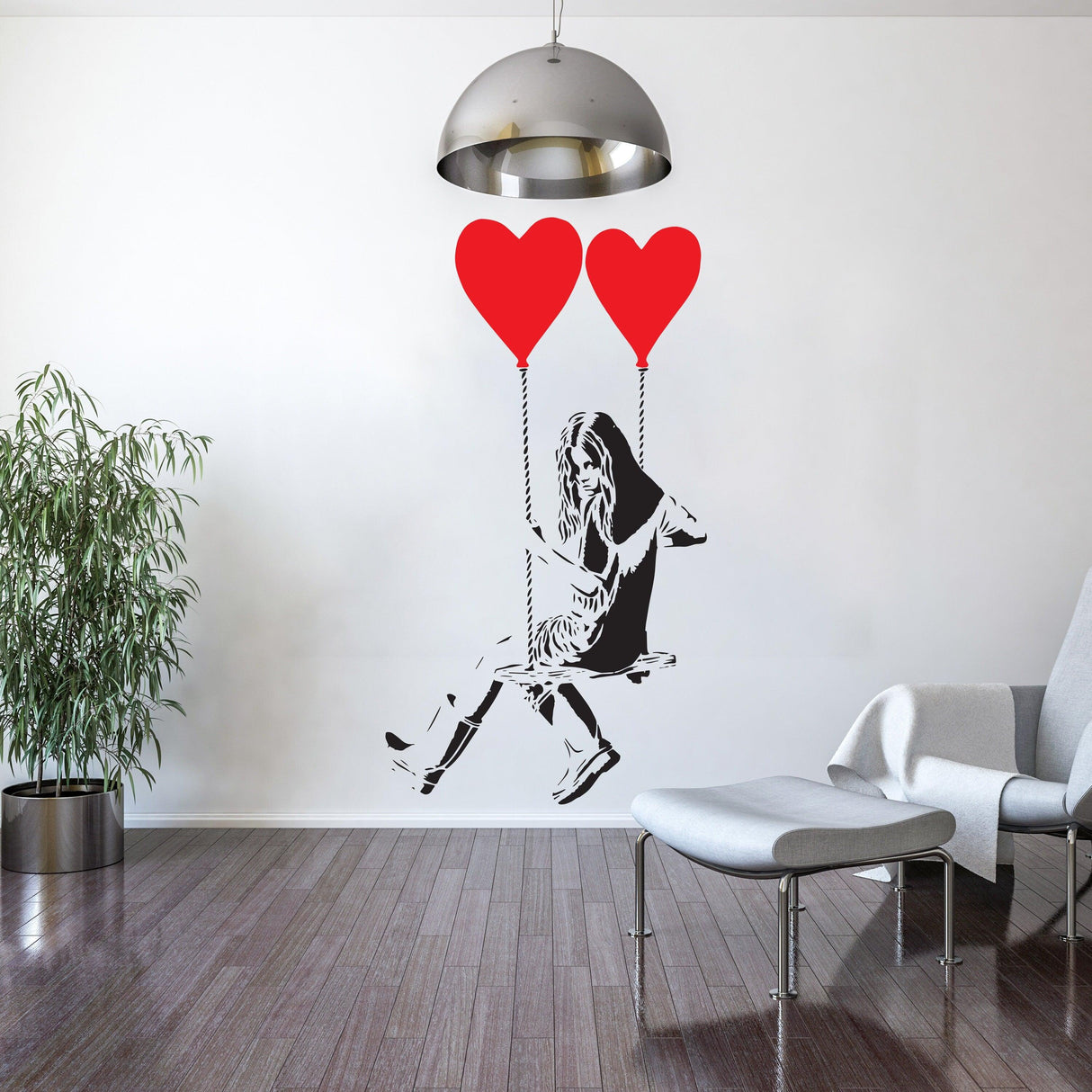 Banksy-inspired wall sticker of a girl on a swing with heart-shaped balloons, adding artistic flair to a modern interior.