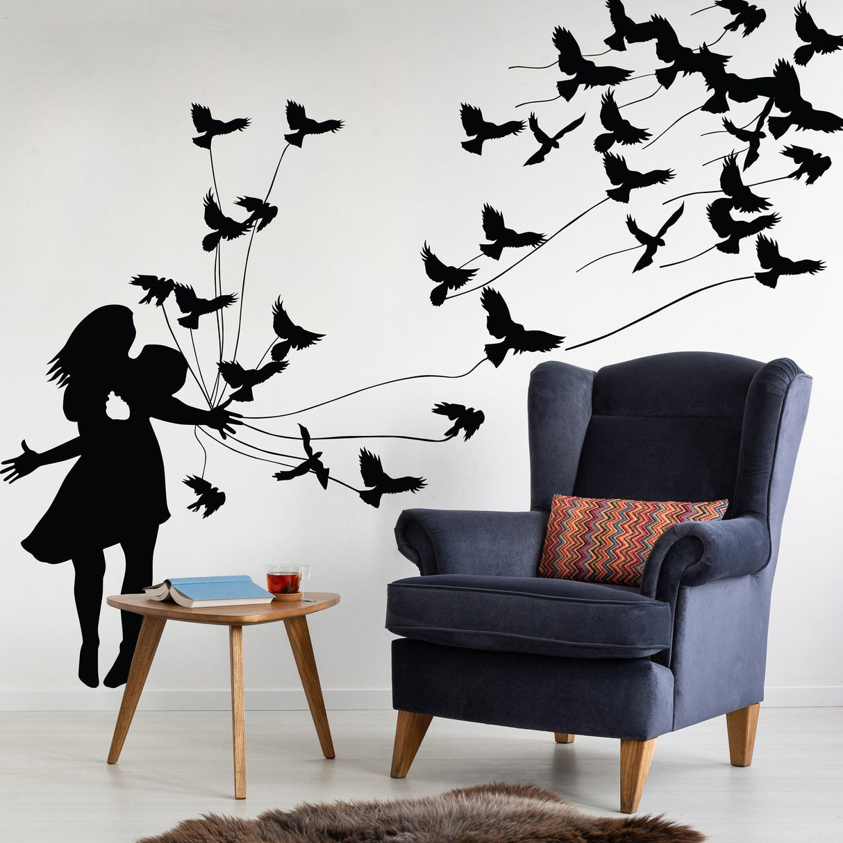Kissing wall decal of a girl and birds, perfect for home decor; adds charm and warmth to any room.