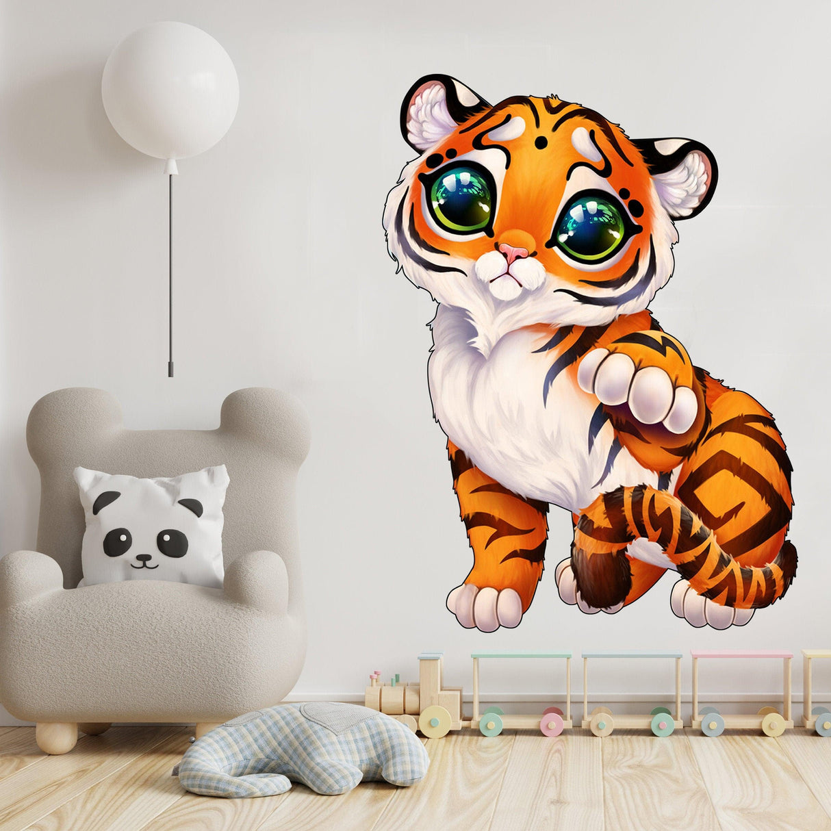 Cute tiger wall sticker in a child's room, featuring playful design with big eyes, perfect for baby or toddler decoration.