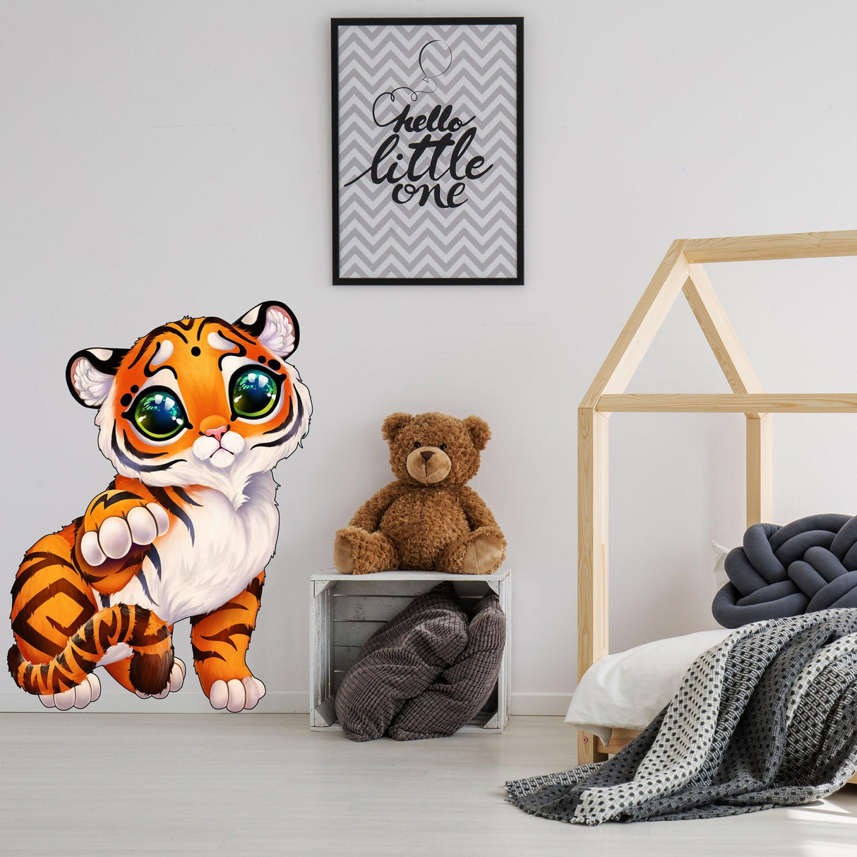 Cute tiger wall sticker in children's room, playful design beside teddy bear, perfect decor for toddlers.