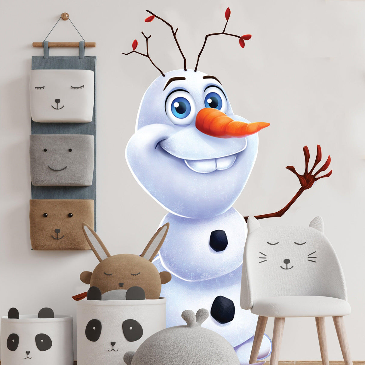 Cheerful snowman wall sticker, perfect for holiday decor in a cozy children's room.