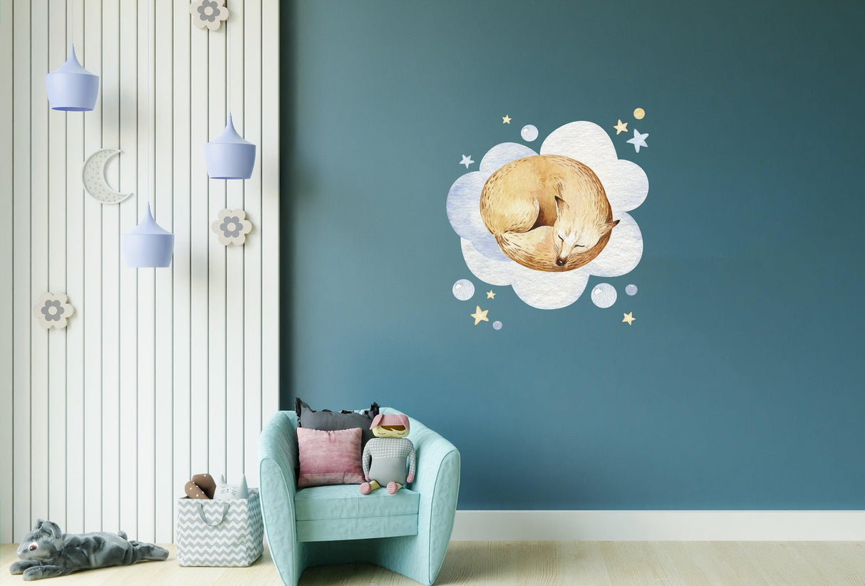 Baby nursery wall sticker featuring a sleeping fox design among clouds and stars, perfect for a boy or girl room decor.