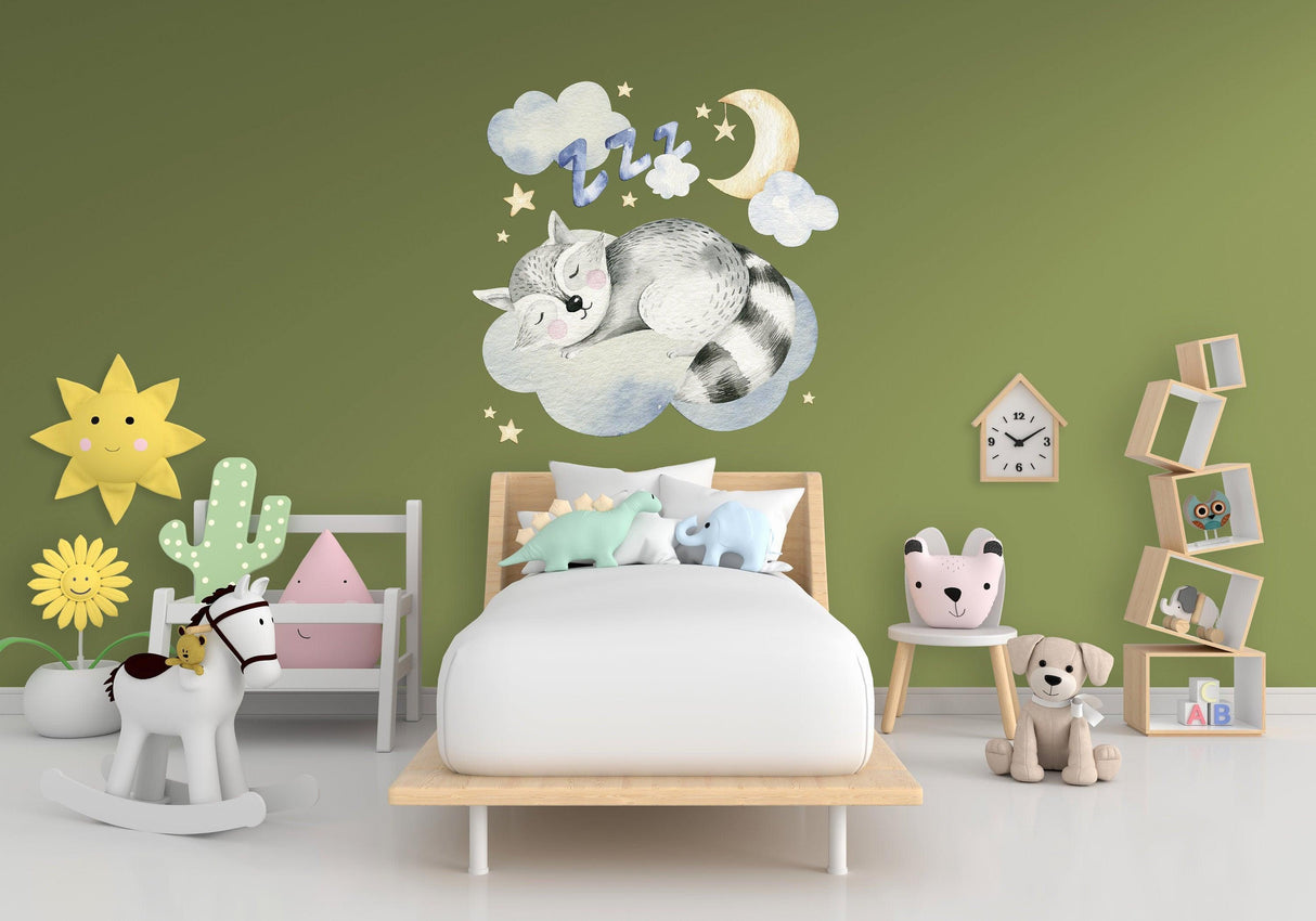Cute sleeping animal nursery wall sticker featuring a raccoon on a cloud, perfect for baby room decor.
