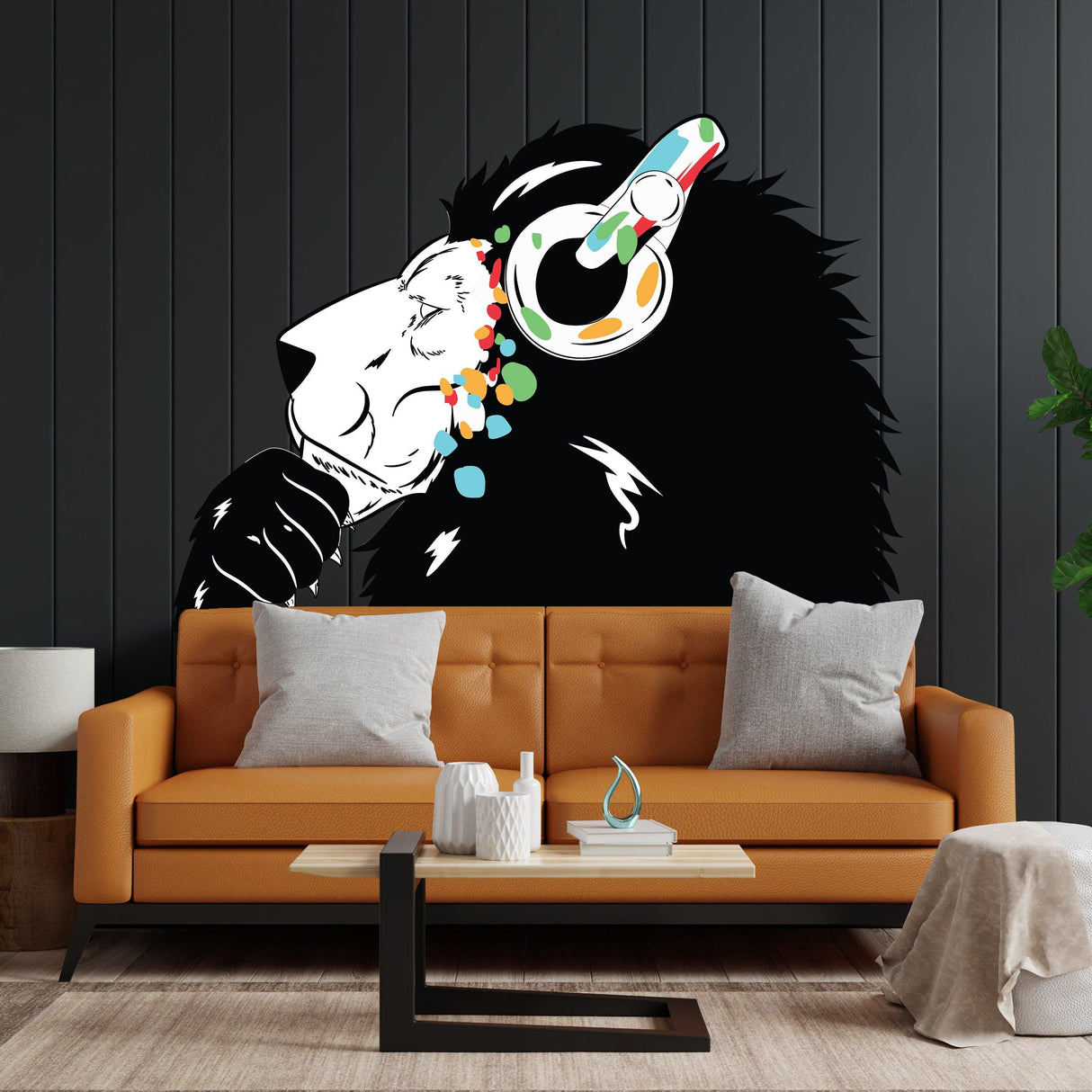 Thinking Lion Sticker with headphones and colorful details on a black wall above a modern sofa.