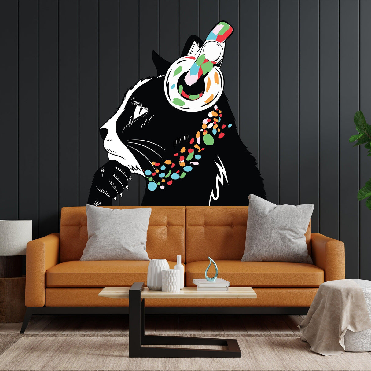 Cat wall art sticker of a thoughtful DJ kitten with headphones, adding playful decor to a modern living room.