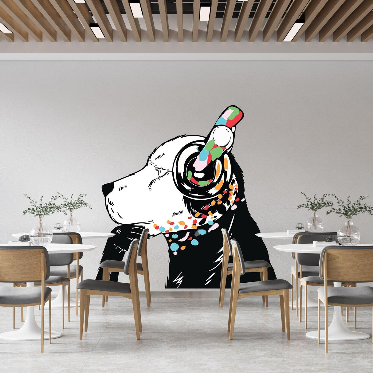 Dog in headphones wall sticker adding urban style to a modern cafe interior, inspired by Banksy graffiti.
