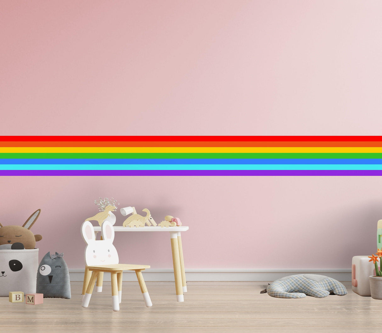 Rainbow stripe vinyl wall decal decoration for nursery, adding color and fun to a child's room or birthday party.