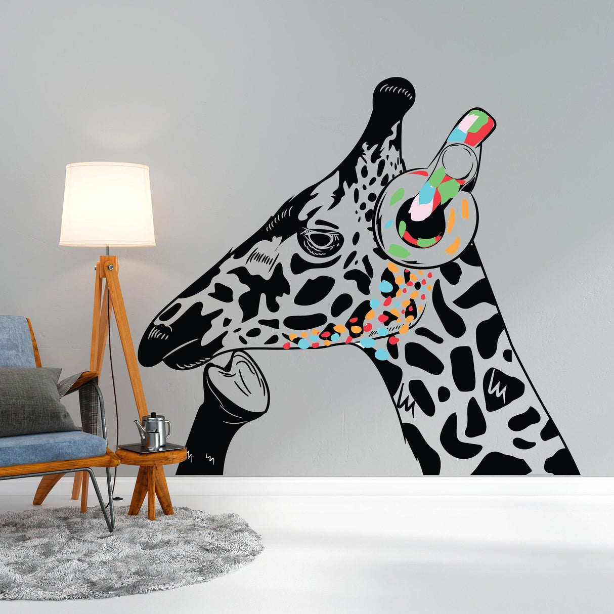 Whimsical giraffe wearing colorful headphones on a wall decal, inspired by Banksy graffiti art.
