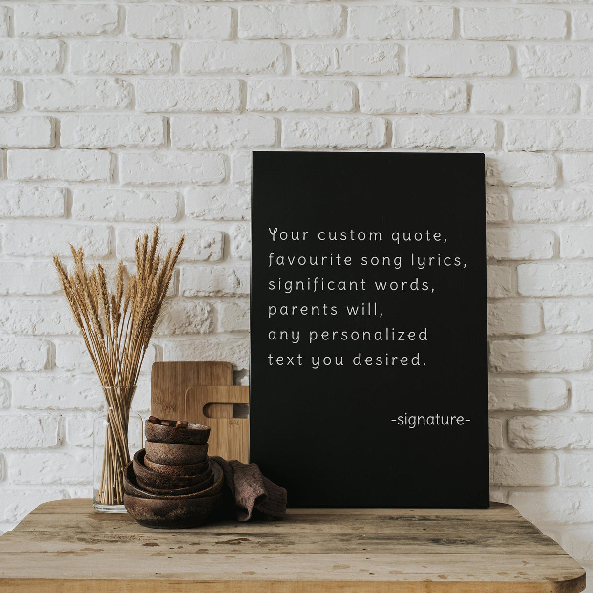 Customized canvas artwork featuring personalized quote and song lyrics on a stylish display.
