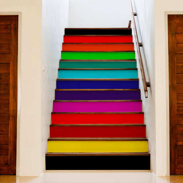 Vibrant rainbow stair riser stickers applied to wooden staircase, enhancing home decor with colorful designs.