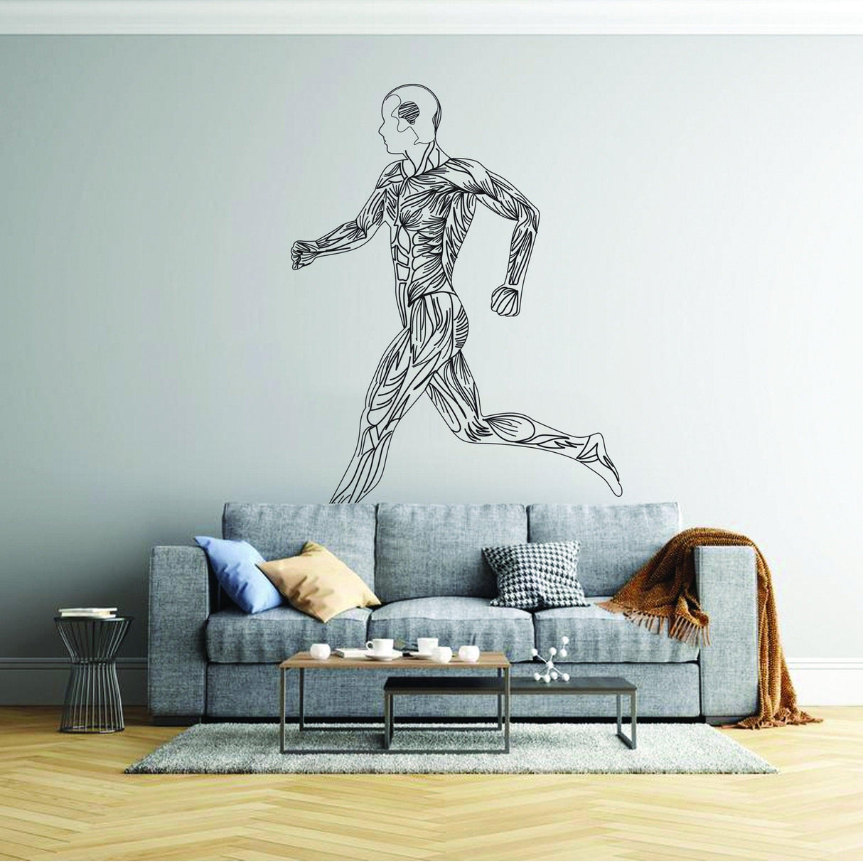 Animated silhouette wall decal of a muscular man running, perfect for fitness-focused home decor.