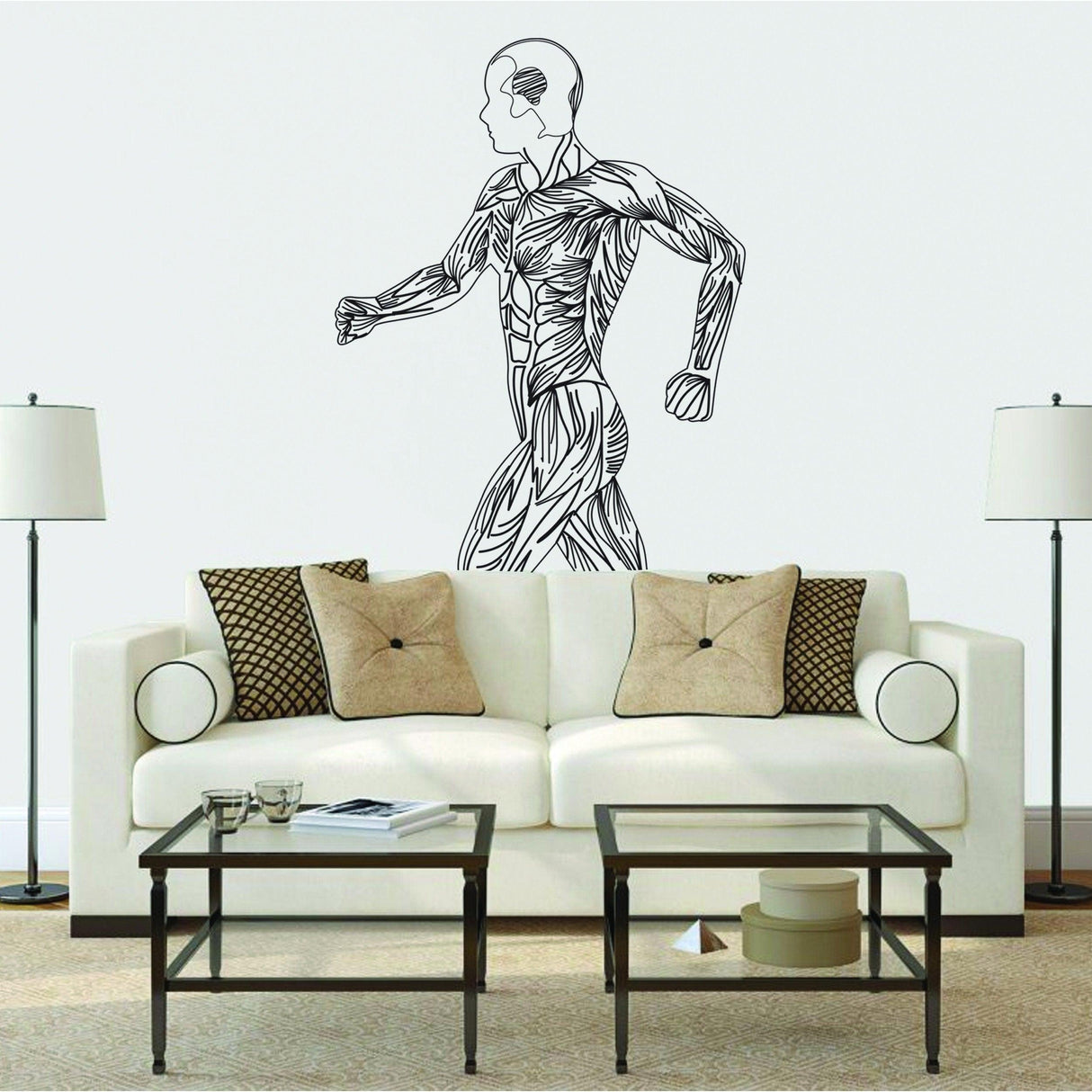Mens body silhouette wall decal in a living room, featuring a fitness illustration above a stylish sofa.