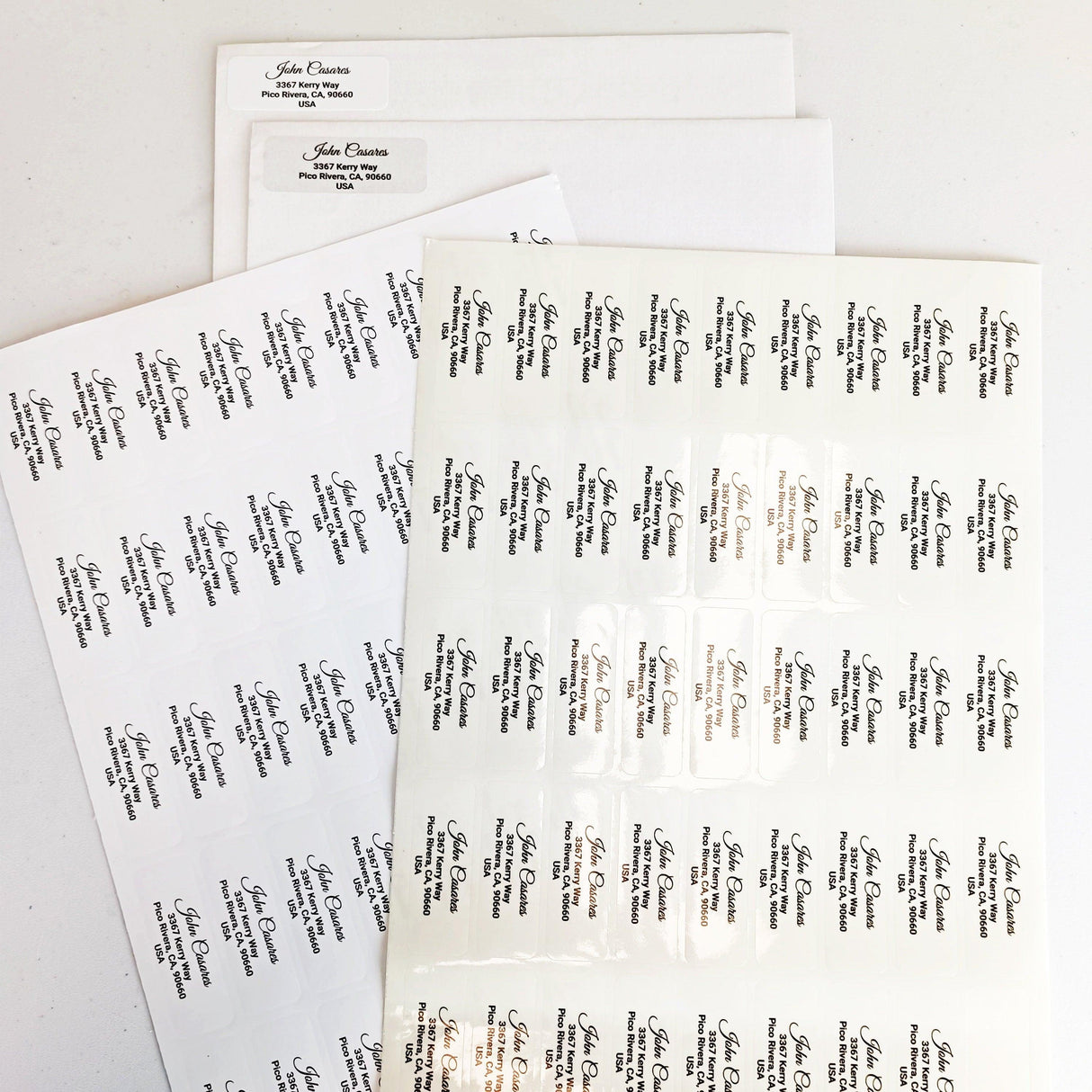Personalized return address labels on sheets, showcasing custom designs for stylish mailing and shipping.