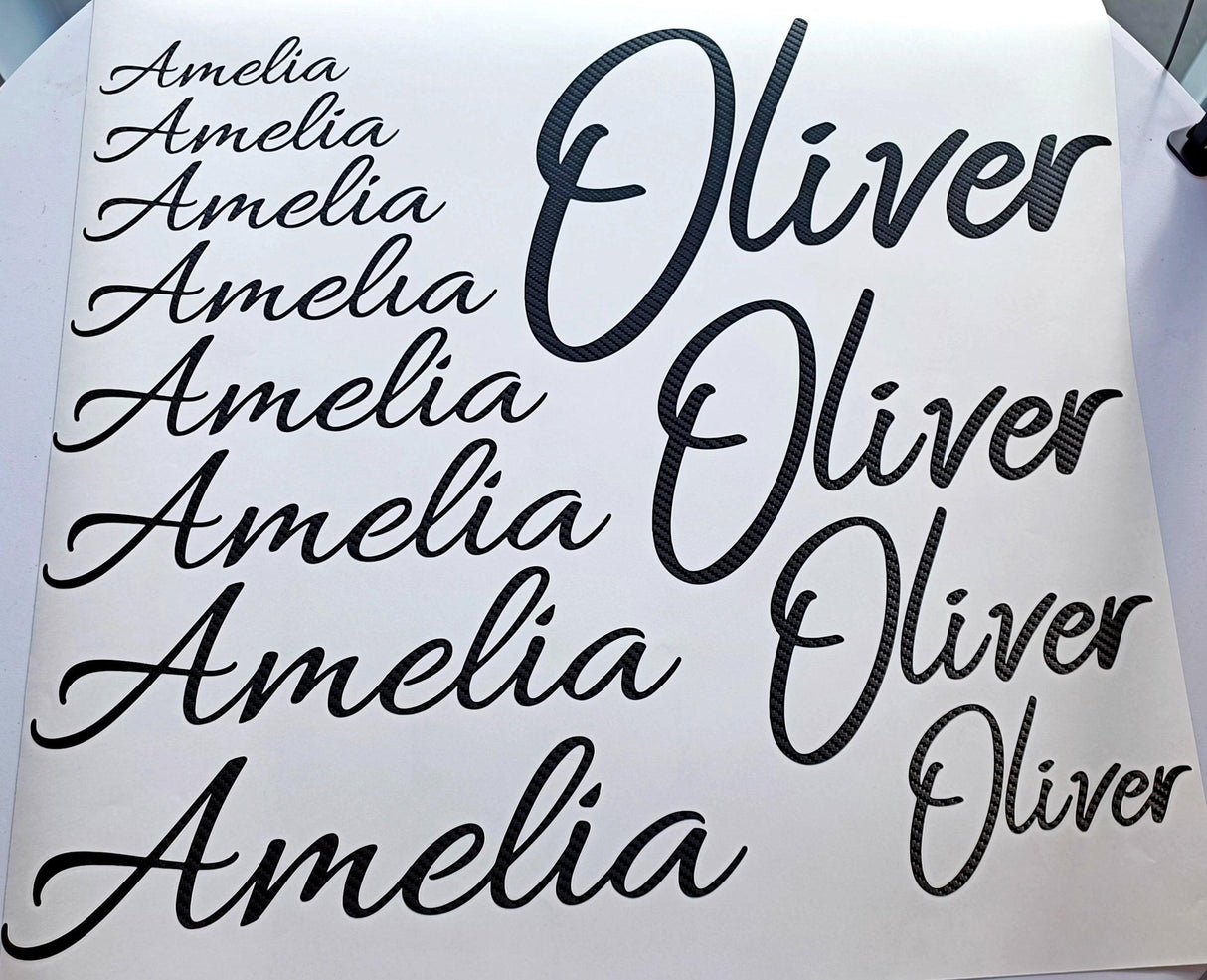 Personalised vinyl name decals featuring variations of the names Amelia and Oliver in stylish font.
