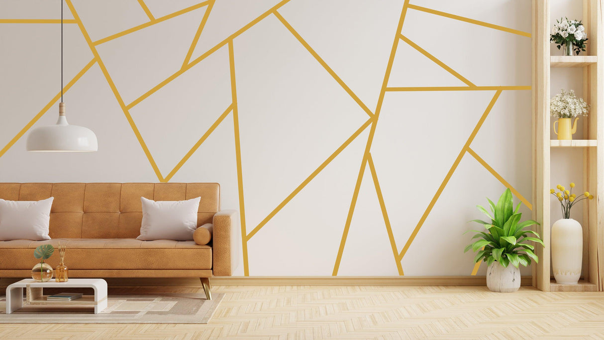 Gold thin line geometric wall decals in modern living room, enhancing bedroom decor with elegance.