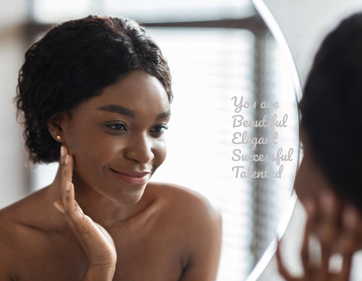 Woman smiling at mirror with inspirational affirmation quote decal promoting self-love and positivity.