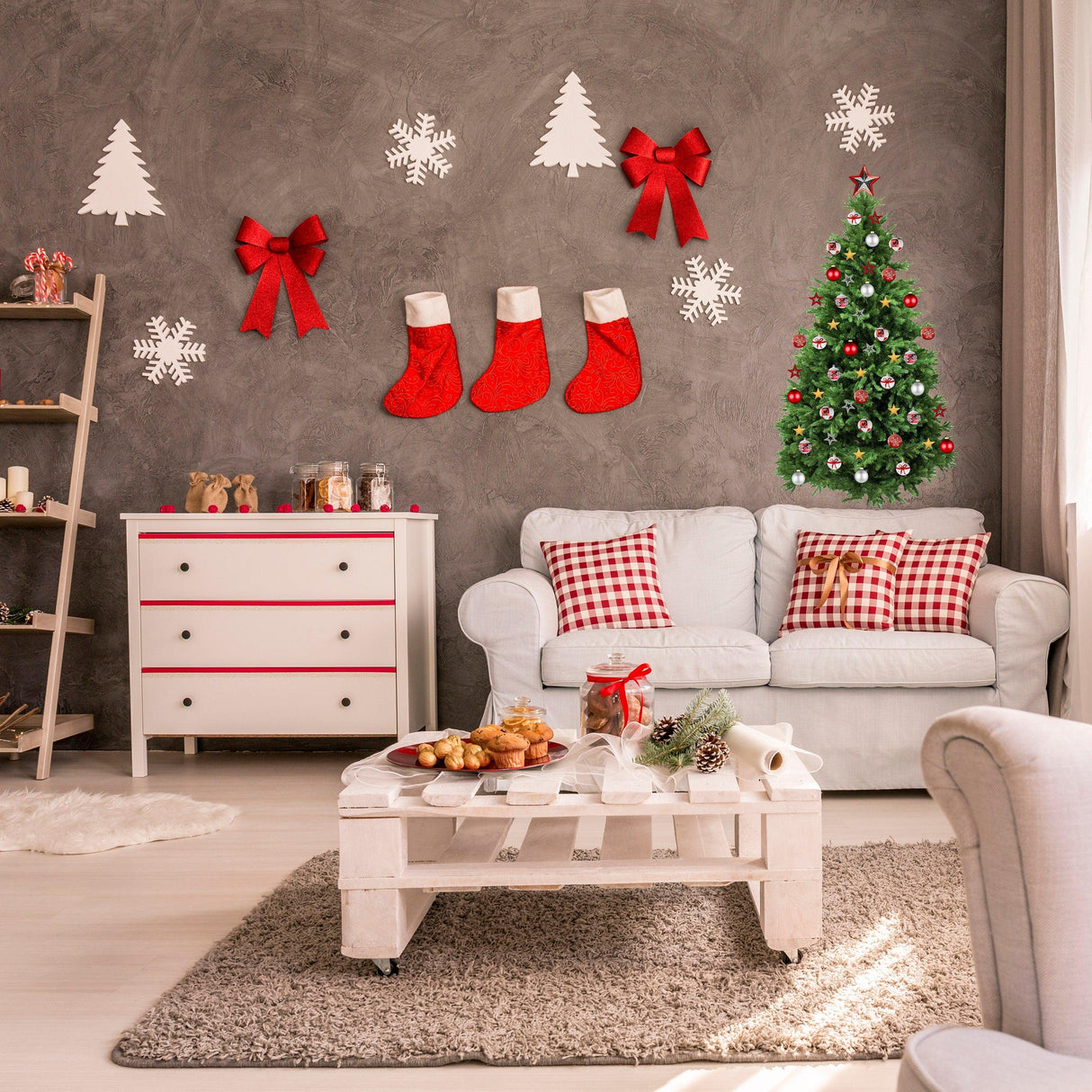Cozy living room decorated with Christmas tree wall decals, stockings, bows, and festive ornaments.