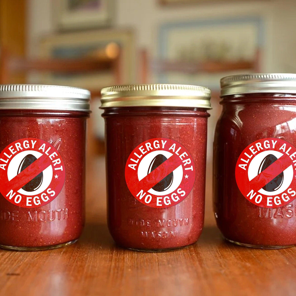 Three jars with 'Allergy Alert No Eggs' stickers, highlighting food allergy awareness and safety.