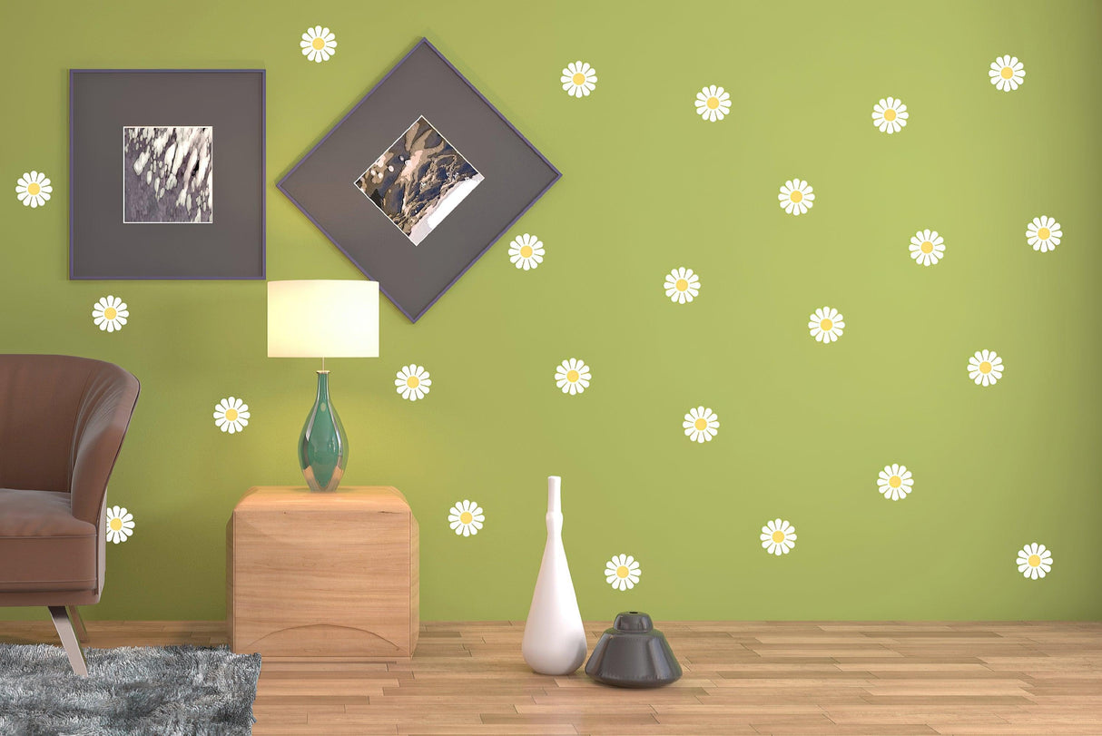Elegant white daisy wall decals on green wall, creating a fresh and charming floral decor for any room.