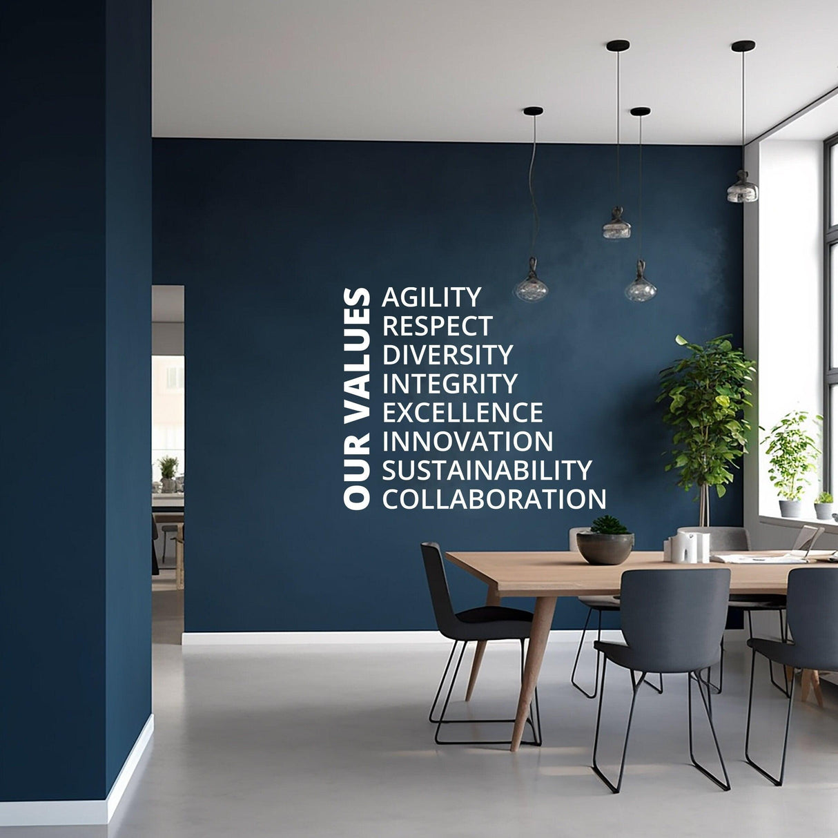 Office wall featuring 'Our Values' decal listing Agility, Respect, Diversity, and more in a modern conference room.
