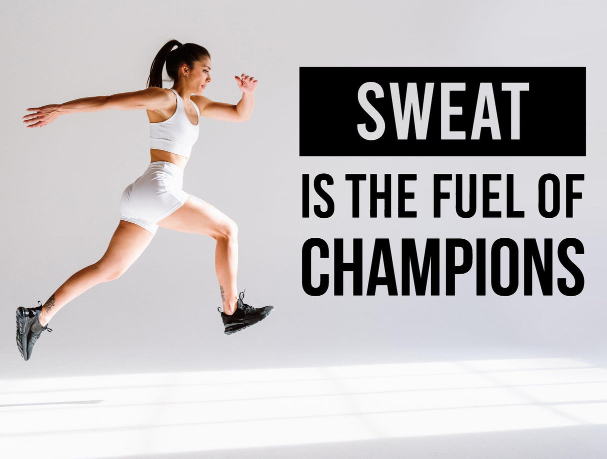 Motivational wall decal featuring the quote 'Sweat is the Fuel of Champions' with a fit woman exercising.